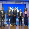 Os candidatos Adiló, Scalco, Felipe e Denise, junto ao  mediador Fabiano