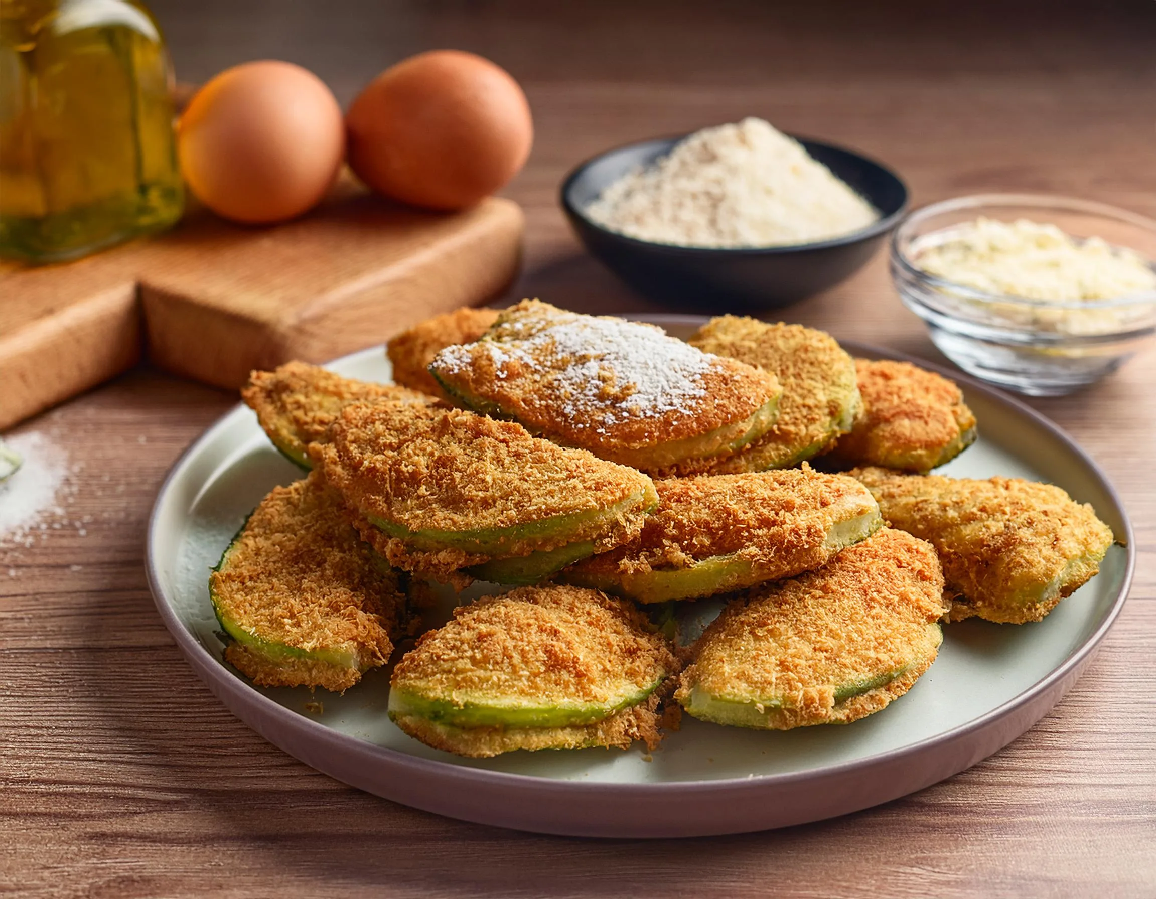 Abobrinha empanada com queijo parmesão e farinha de rosca