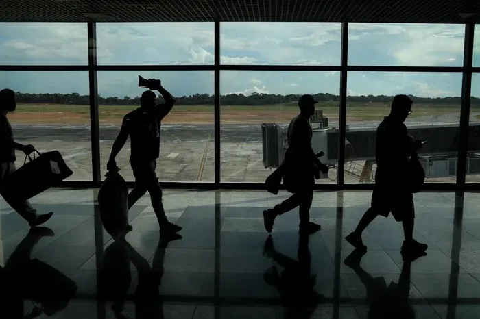 Esse foi o quarto voo trazendo brasileiros deportados de volta ao país. (Michael Dantas/AFP)