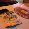 foram encontrados quatro porções de maconha, uma porção de cocaína, uma porção de crack, um celular e R$ 310, em moeda corrente. (Foto: 36º BPM)