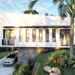 Casa moderna com design minimalista, varanda e garagem coberta, com gramado e palmeira.